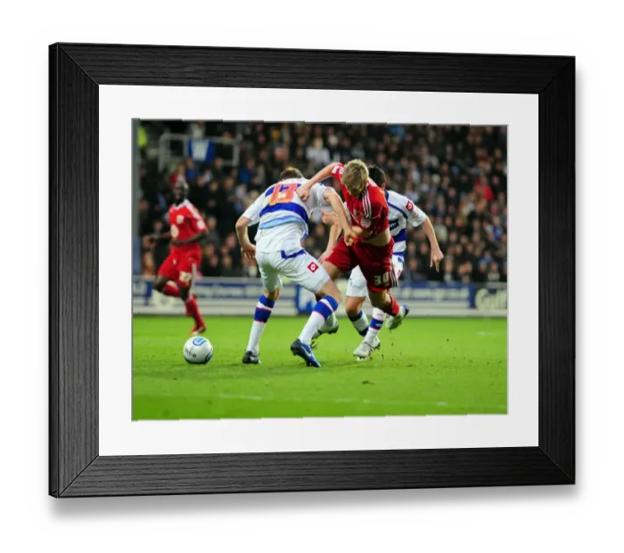 Framed Print : Jon Stead Fouled by Kaspars Gorkss: Championship Clash Between QPR and Bristol City (03 / 01 / 2011) Framed Print : Jon Stead Fouled by Kaspars Gorkss: Championship Clash Between QPR and Bristol City (03 / 01 / 2011)
