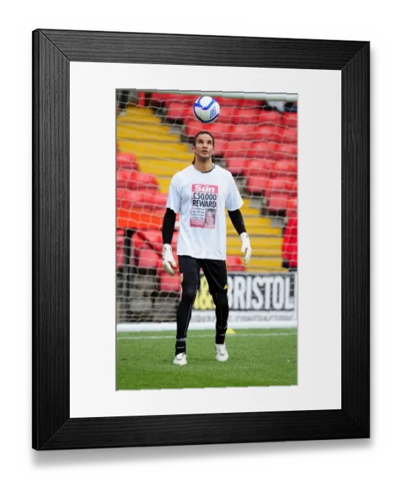 Framed Print : Bristol City's David James Honors Joanna Yeates in FA Cup Warm-Up with T-Shirt Displaying £50, 000 Reward Framed Print : Bristol City's David James Honors Joanna Yeates in FA Cup Warm-Up with T-Shirt Displaying £50, 000 Reward