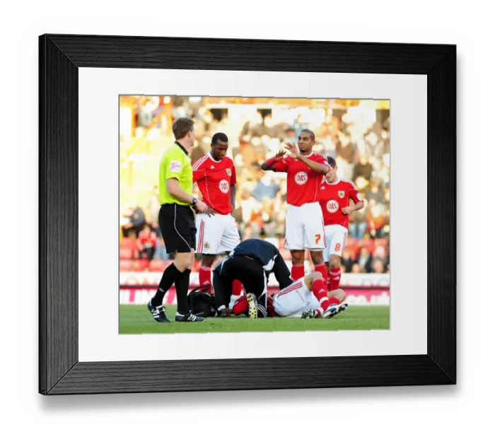 Framed Print : Marvin Elliott Communicates with Bench as Steven Caulker is Attended to - FA Cup: Bristol City vs Sheffield Wednesday (08 / 01 / 2011) Framed Print : Marvin Elliott Communicates with Bench as Steven Caulker is Attended to - FA Cup: Bristol City vs Sheffield Wednesday (08 / 01 / 2011)