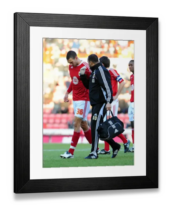Framed Print : Bristol City's Steven Caulker Suffers Injury Exit Against Sheffield Wednesday, FA Cup, 08 / 01 / 2011 Framed Print : Bristol City's Steven Caulker Suffers Injury Exit Against Sheffield Wednesday, FA Cup, 08 / 01 / 2011