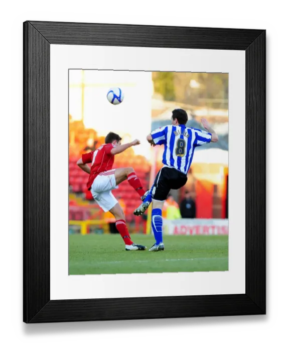 Framed Print : Johnson vs Miller: FA Cup Clash at Ashton Gate - Lee Johnsons Foul on Tommy Miller (Bristol City vs Sheffield Wednesday, 08 / 01 / 2011)