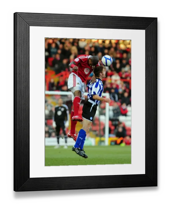 Framed Print : Battling for Supremacy: Marvin Elliott vs. James O'Connor in the FA Cup Clash between Bristol City and Sheffield Wednesday Framed Print : Battling for Supremacy: Marvin Elliott vs. James O'Connor in the FA Cup Clash between Bristol City and Sheffield Wednesday