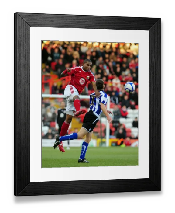 Framed Print : Battling for FA Cup Supremacy: Marvin Elliott vs. James O'Connor (Bristol City vs. Sheffield Wednesday, 2011) Framed Print : Battling for FA Cup Supremacy: Marvin Elliott vs. James O'Connor (Bristol City vs. Sheffield Wednesday, 2011)