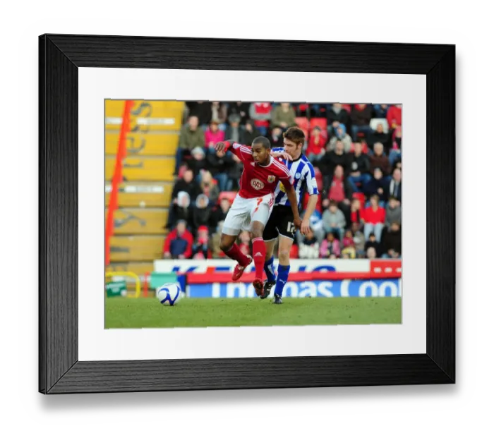 Framed Print : Battling for FA Cup Victory: Marvin Elliott vs. James O'Connor (Bristol City vs. Sheffield Wednesday, 2011)