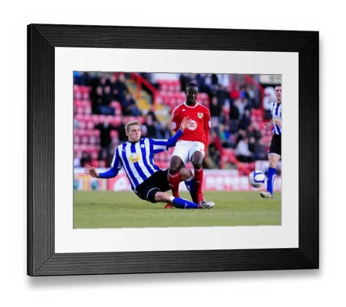 Framed Print : A Tackle in the FA Cup: Daniel Jones vs. Albert Adomah (Bristol City vs. Sheffield Wednesday, 08 / 01 / 2011) Framed Print : A Tackle in the FA Cup: Daniel Jones vs. Albert Adomah (Bristol City vs. Sheffield Wednesday, 08 / 01 / 2011)