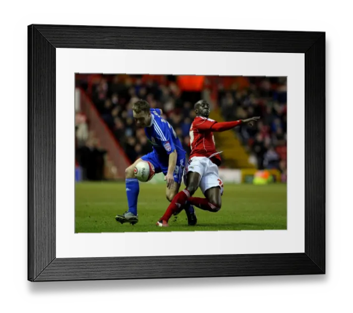 Framed Print : Adomah vs. Taylor: Battling for Championship Supremacy - Bristol City vs. Middlesbrough, 2011 Framed Print : Adomah vs. Taylor: Battling for Championship Supremacy - Bristol City vs. Middlesbrough, 2011