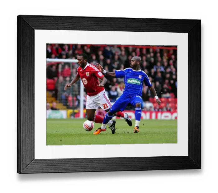 Framed Print : Bristol City vs Middlesbrough: Leroy Lita Fouls Kalifa Cisse in Championship Clash at Ashton Gate Stadium (15 / 01 / 2011)