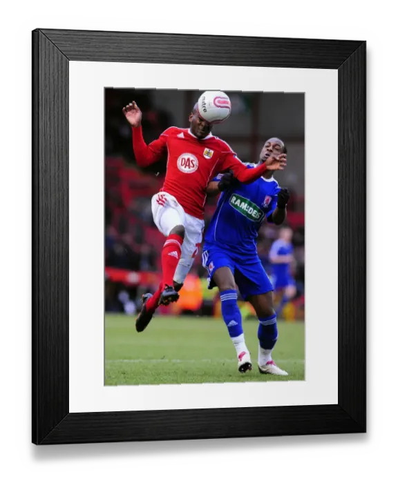 Framed Print : Intense Rivalry: Campbell-Ryce vs. Hoyte in the Championship Clash between Bristol City and Middlesbrough Framed Print : Intense Rivalry: Campbell-Ryce vs. Hoyte in the Championship Clash between Bristol City and Middlesbrough