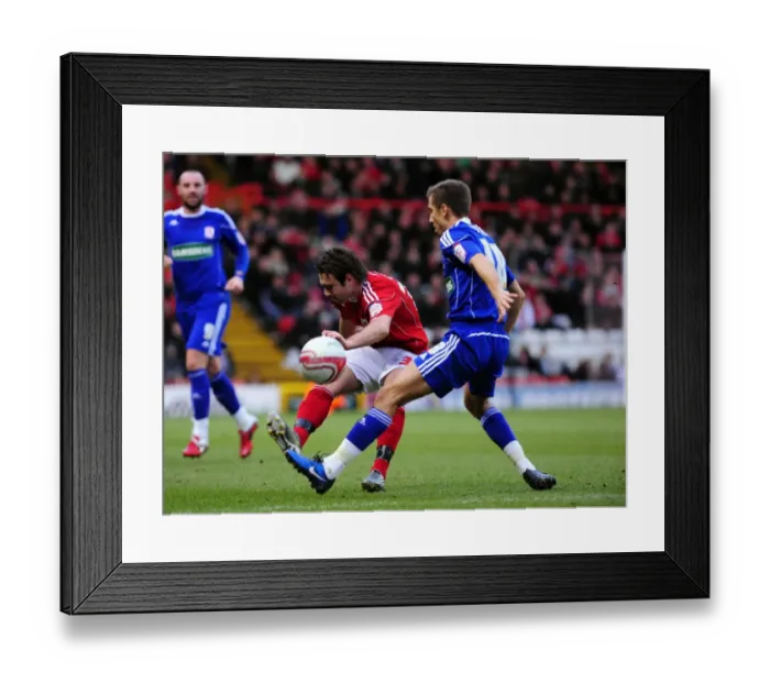 Framed Print : Brett Pitman Clears the Ball: Bristol City vs. Middlesbrough, Championship Match, Ashton Gate Stadium, 15th January 2011