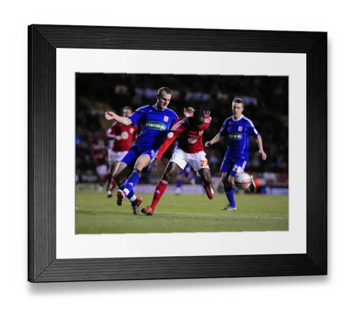 Framed Print : Adomah vs. Wheater: Intense Battle for the Ball in Bristol City vs. Middlesbrough Championship Clash, 15 / 01 / 2011