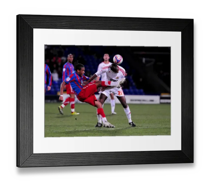Framed Print : Brave Clash: Kalifa Cisse vs. Neil Danns - Crystal Palace vs. Bristol City, 2011 Framed Print : Brave Clash: Kalifa Cisse vs. Neil Danns - Crystal Palace vs. Bristol City, 2011