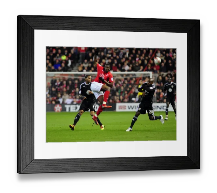 Framed Print : Moussi Clears for Forest Against Bristol City, Championship 2011 Framed Print : Moussi Clears for Forest Against Bristol City, Championship 2011