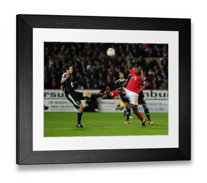 Framed Print : Battling for Supremacy: Cole Skuse vs. Guy Moussi in Nottingham Forest vs. Bristol City Football Match, 2011