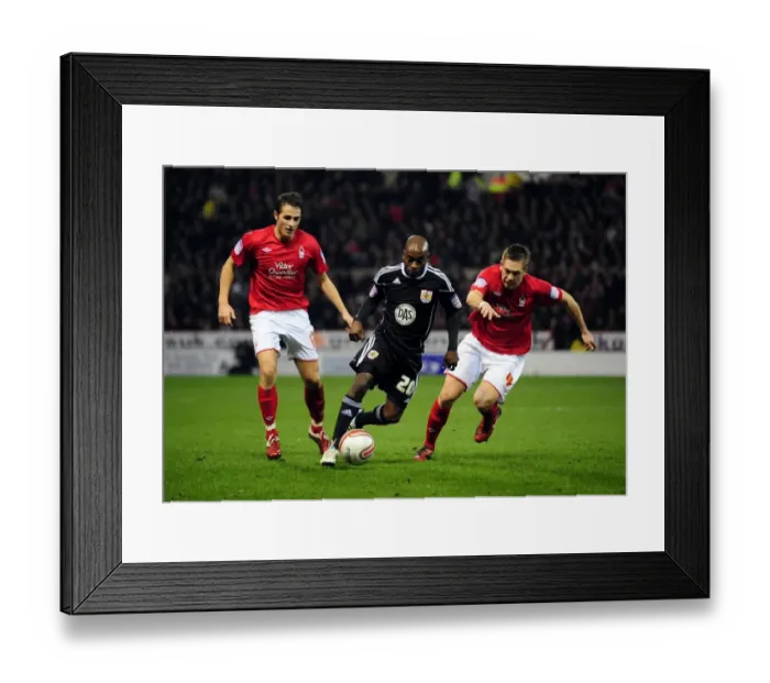 Framed Print : Battling for the Ball: Jamal Campbell-Ryce Faces Off Against Luke Chambers and Chris Cohen in Intense Npower Championship Match