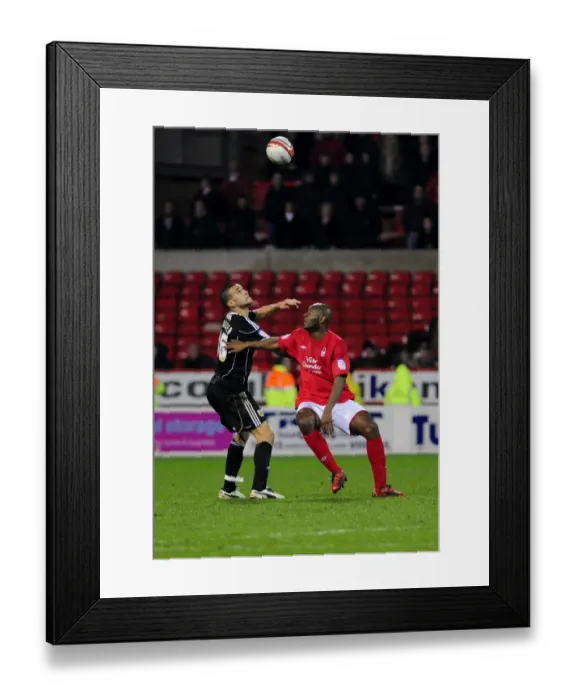 Framed Print : Battling for Supremacy: Adebola vs. Caulker in Forest vs. Bristol City Championship Clash Framed Print : Battling for Supremacy: Adebola vs. Caulker in Forest vs. Bristol City Championship Clash
