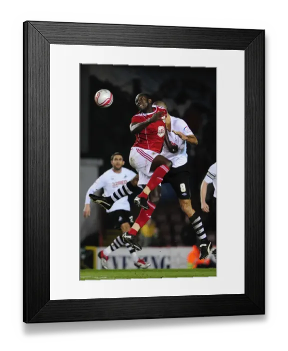 Framed Print : Battling for the Ball: Stewart vs. Pratley in the Intense Championship Clash between Bristol City and Swansea City (01 / 02 / 2011) Framed Print : Battling for the Ball: Stewart vs. Pratley in the Intense Championship Clash between Bristol City and Swansea City (01 / 02 / 2011)