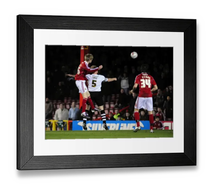 Framed Print : Andy Keogh's Close Header: Bristol City vs Swansea City, Championship Match, January 2011 Framed Print : Andy Keogh's Close Header: Bristol City vs Swansea City, Championship Match, January 2011