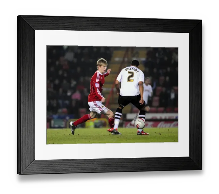 Framed Print : Andy Keogh Beats Ashley Williams: A Pivotal Moment in the 2011 Championship Clash Between Bristol City and Swansea City Framed Print : Andy Keogh Beats Ashley Williams: A Pivotal Moment in the 2011 Championship Clash Between Bristol City and Swansea City