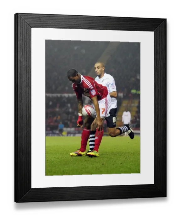 Framed Print : Battling for Supremacy: Marvin Elliott vs. Darren Pratley in the Intense Championship Clash between Bristol City and Swansea City (01 / 02 / 2011) Framed Print : Battling for Supremacy: Marvin Elliott vs. Darren Pratley in the Intense Championship Clash between Bristol City and Swansea City (01 / 02 / 2011)