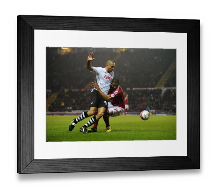 Framed Print : Battling for Championship Supremacy: Marvin Elliott vs. Darren Pratley (Bristol City vs. Swansea City, 2011)