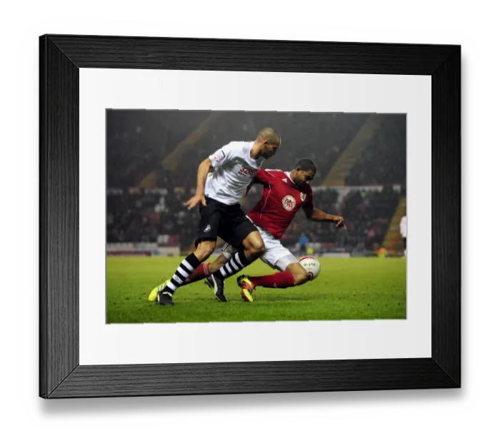 Framed Print : Battling for Championship Glory: Marvin Elliott vs. Darren Pratley (Bristol City vs. Swansea City, 2011)