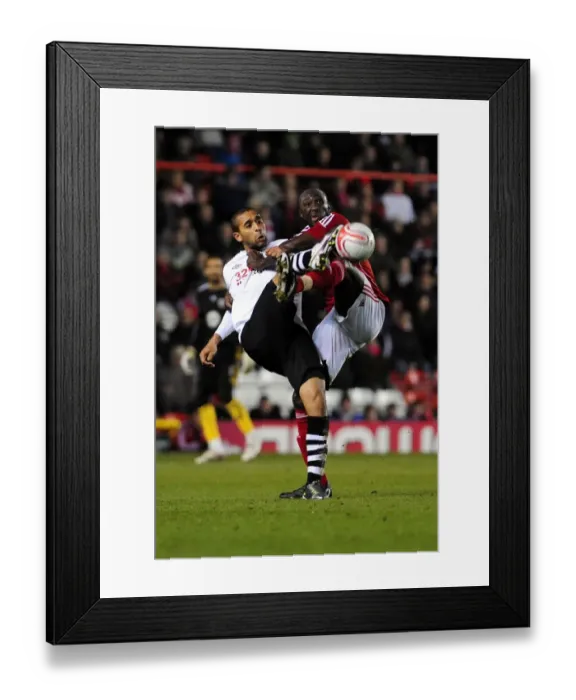 Framed Print : Battling for Championship Supremacy: Stewart vs Moore - A Football Rivalry at Ashton Gate (Bristol City vs Swansea City, 2011)
