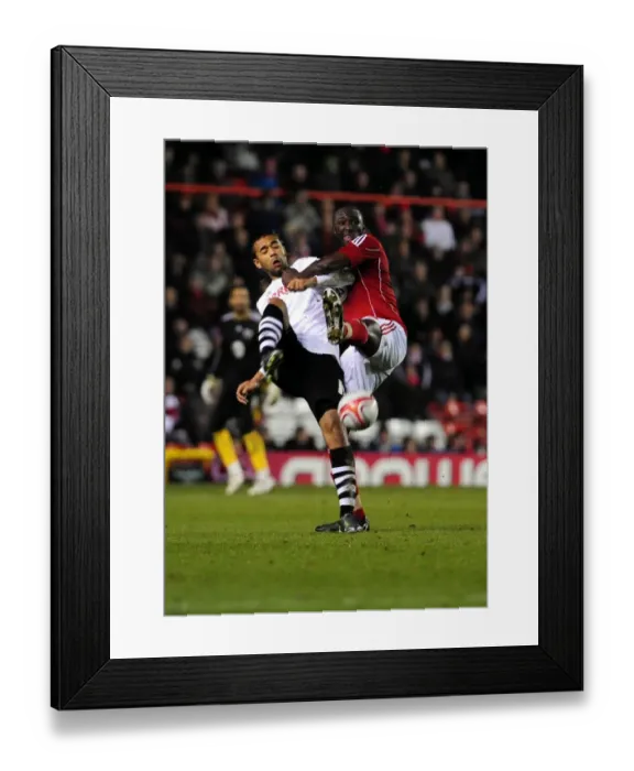 Framed Print : Battling for Supremacy: Damion Stewart vs. Luke Moore in the 2011 Championship Clash between Bristol City and Swansea City Framed Print : Battling for Supremacy: Damion Stewart vs. Luke Moore in the 2011 Championship Clash between Bristol City and Swansea City