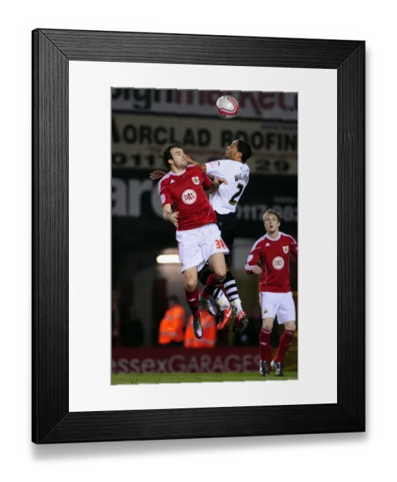 Framed Print : Battling for Championship Supremacy: Pitman vs. Williams - The Intense Rivalry (Bristol City vs. Swansea City, 2011)