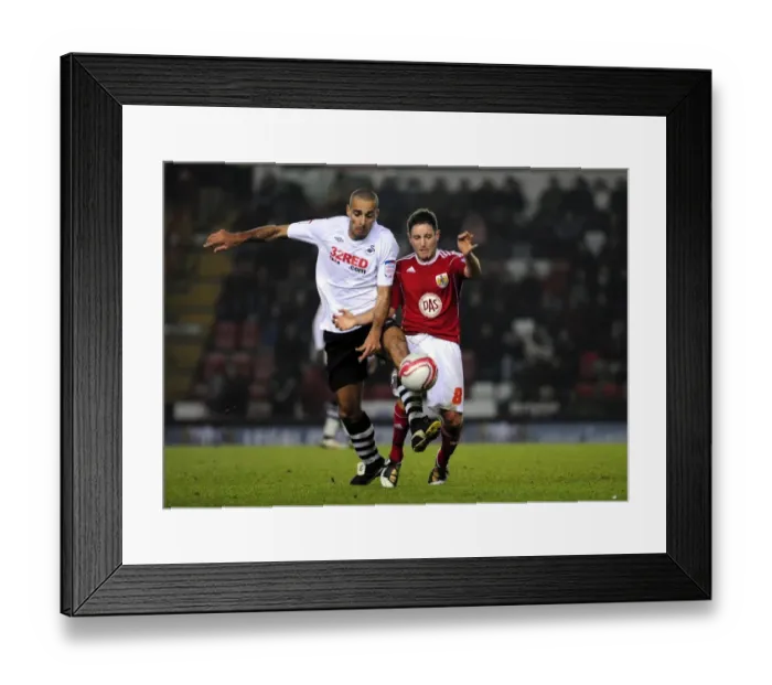 Framed Print : Battling for Supremacy: Johnson vs. Pratley in the 2011 Championship Clash between Bristol City and Swansea City Framed Print : Battling for Supremacy: Johnson vs. Pratley in the 2011 Championship Clash between Bristol City and Swansea City