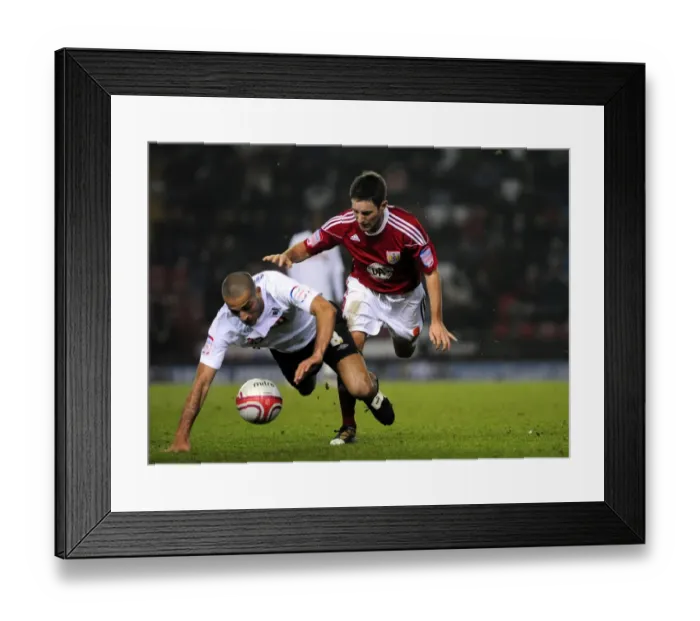 Framed Print : Battling for Championship Supremacy: Johnson vs. Pratley (2011) - A Football Rivalry at Ashton Gate