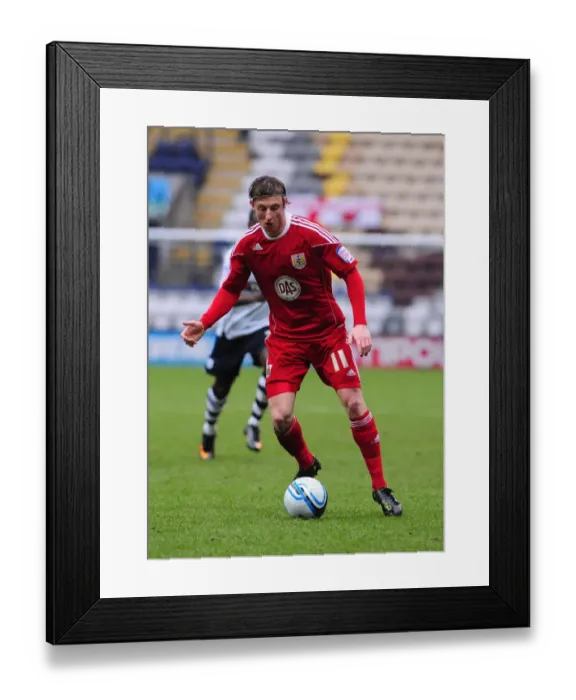 Framed Print : Martyn Woolford in Action: Championship Showdown between Preston and Bristol City - February 2011