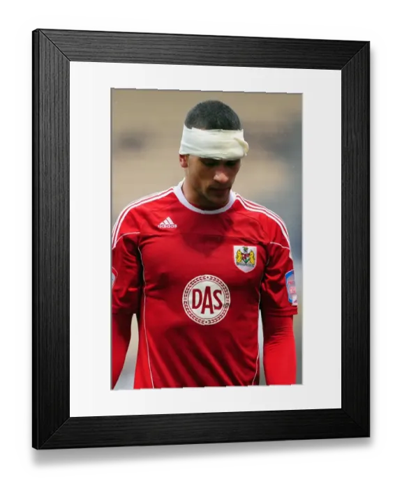 Framed Print : Steven Caulker's Determined Showdown: Championship Clash at Deepdale Stadium (Preston v Bristol City, 05 / 02 / 2011)
