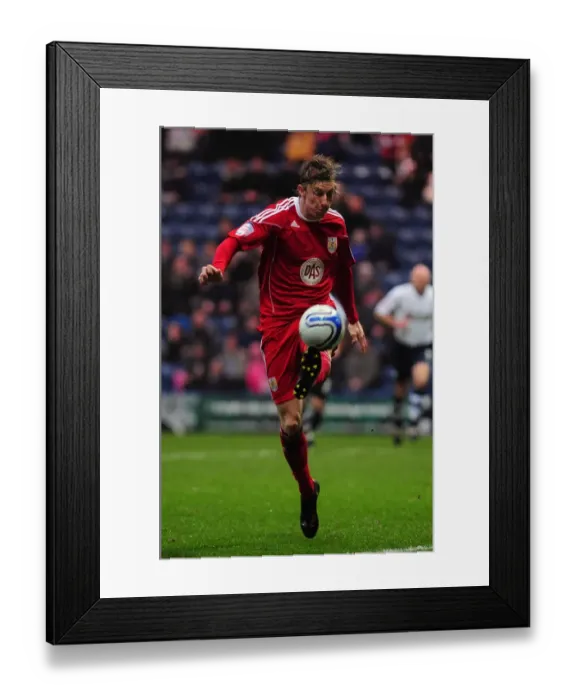 Framed Print : Championship Showdown: Martyn Woolford in Action - Bristol City vs. Preston North End (2011) Framed Print : Championship Showdown: Martyn Woolford in Action - Bristol City vs. Preston North End (2011)