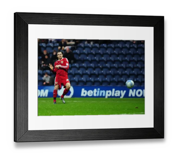 Framed Print : Championship Showdown: Preston North End vs. Bristol City - Football Rivalry at Deepdale Stadium (5th February 2011)