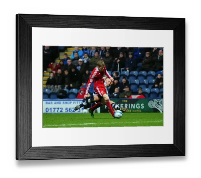 Framed Print : Preston's Wayne Brown Fouls Bristol City's Andy Keogh during Championship Match Framed Print : Preston's Wayne Brown Fouls Bristol City's Andy Keogh during Championship Match