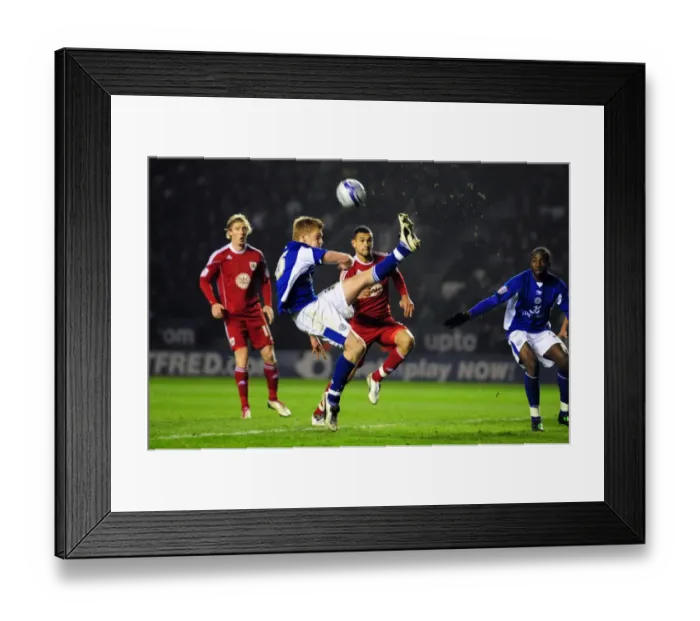Framed Print : Bristol City vs Leicester City: Ben Mee Clears Ball in Championship Clash - 18 / 02 / 2011