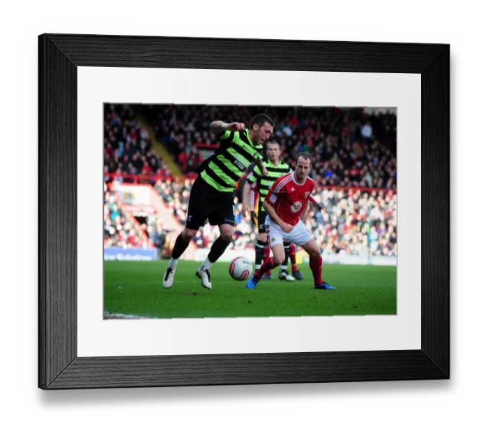 Framed Print : Battling for Supremacy: Carey vs. Miller in the Championship Clash between Bristol City and Scunthorpe United (February 2010) Framed Print : Battling for Supremacy: Carey vs. Miller in the Championship Clash between Bristol City and Scunthorpe United (February 2010)