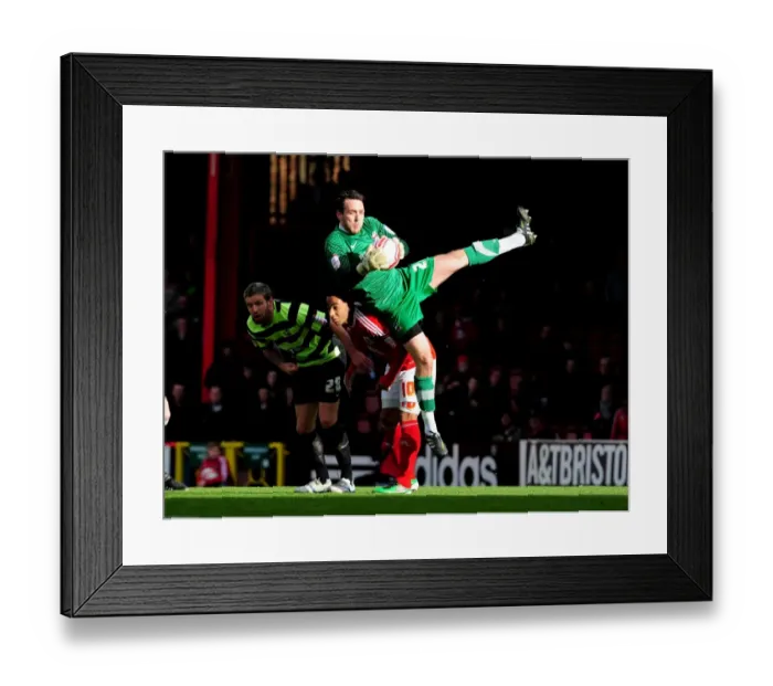 Framed Print : Josh Lillis Claims the Ball: A Pivotal Moment in the 2010 Championship Match between Bristol City and Scunthorpe United
