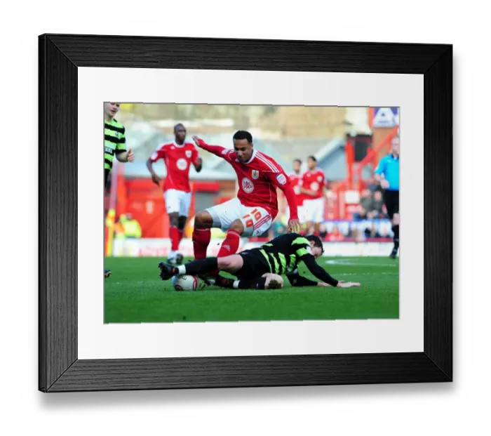 Framed Print : Bristol City's Nicky Maynard Foul by Sam Togwell in Championship Match (Feb 2010) Framed Print : Bristol City's Nicky Maynard Foul by Sam Togwell in Championship Match (Feb 2010)