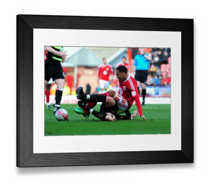 Framed Print : Bristol City's Nicky Maynard Foul by Sam Togwell in Championship Match (Februgary 2010) Framed Print : Bristol City's Nicky Maynard Foul by Sam Togwell in Championship Match (Februgary 2010)