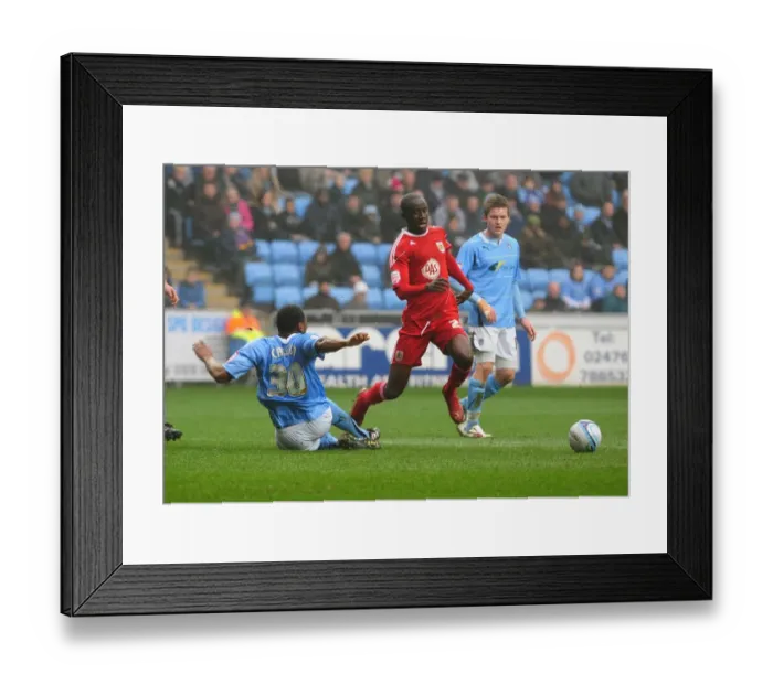 Framed Print : Adomah Penalty Drama: Coventry's Nathan Cameron Fouls Bristol City's Albert Adomah at Ricoh Arena (05 / 03 / 2011, Championship) Framed Print : Adomah Penalty Drama: Coventry's Nathan Cameron Fouls Bristol City's Albert Adomah at Ricoh Arena (05 / 03 / 2011, Championship)