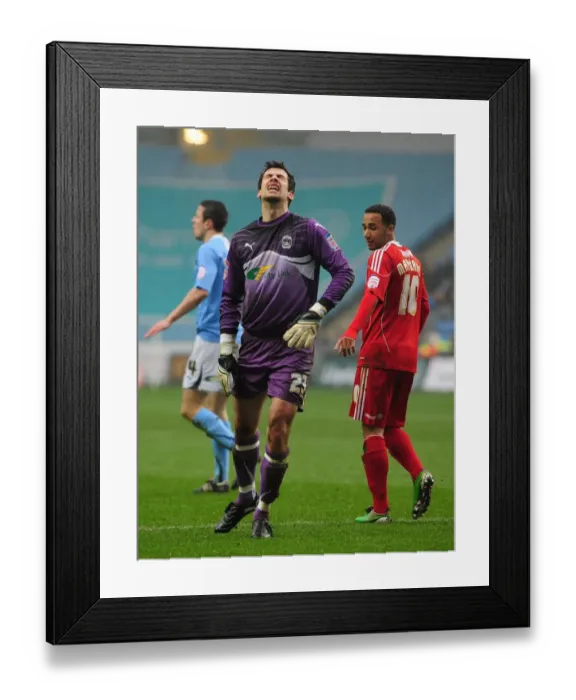 Framed Print : Coventry's Danny Ireland Injured After Replacing Keiren Westwood for Coventry City vs. Bristol City, Championship Match, March 5, 2011 Framed Print : Coventry's Danny Ireland Injured After Replacing Keiren Westwood for Coventry City vs. Bristol City, Championship Match, March 5, 2011