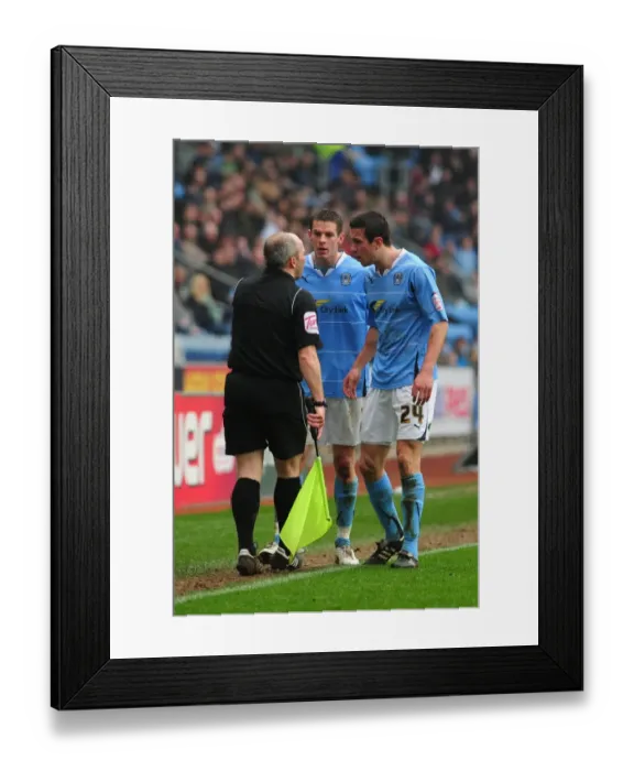 Framed Print : Tense Championship Clash: Wood Argues with Linesman between Coventry City and Bristol City (05 / 03 / 2011) Framed Print : Tense Championship Clash: Wood Argues with Linesman between Coventry City and Bristol City (05 / 03 / 2011)