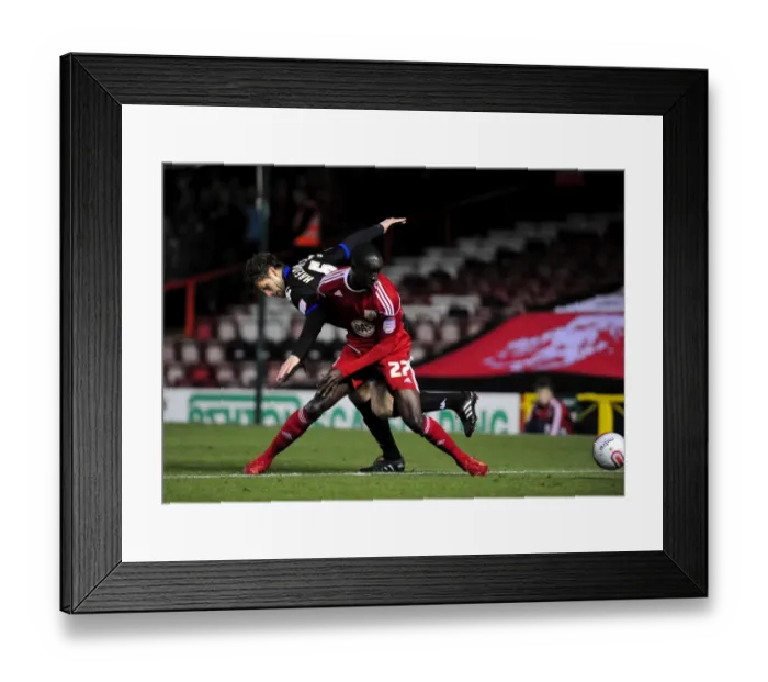 Framed Print : Bristol City vs Portsmouth: Albert Adomah vs Hermann Hreidarsson Battle in Championship Match, 08 / 03 / 2011 Framed Print : Bristol City vs Portsmouth: Albert Adomah vs Hermann Hreidarsson Battle in Championship Match, 08 / 03 / 2011