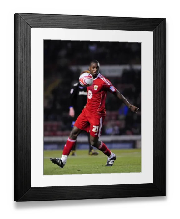Framed Print : Bristol City's Kalifa Cisse in Action against Portsmouth, Championship Match, Ashton Gate Stadium (08 / 03 / 2011)