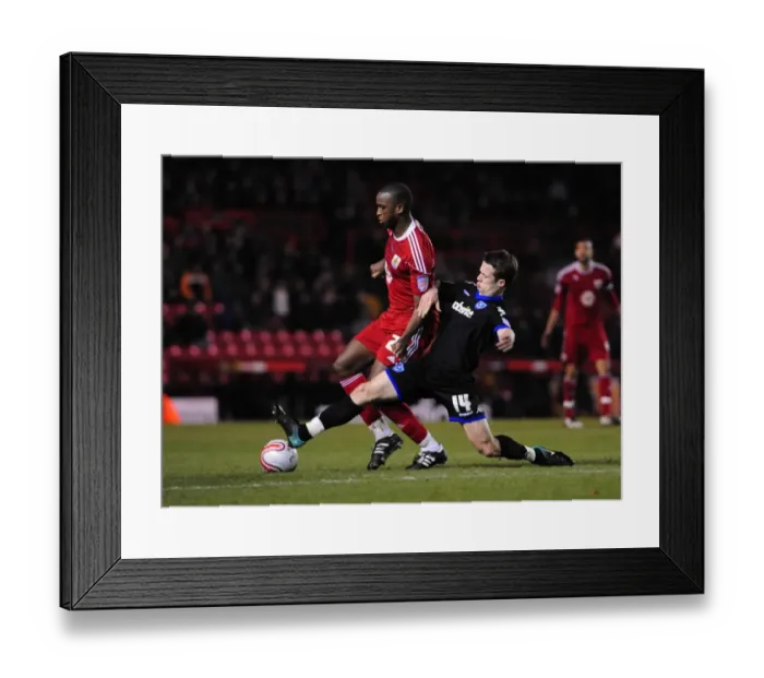 Framed Print : Bristol City vs Portsmouth: Intense Battle Between Kalifa Cisse and Jonathan Hogg in Championship Match, 8th March 2011 Framed Print : Bristol City vs Portsmouth: Intense Battle Between Kalifa Cisse and Jonathan Hogg in Championship Match, 8th March 2011