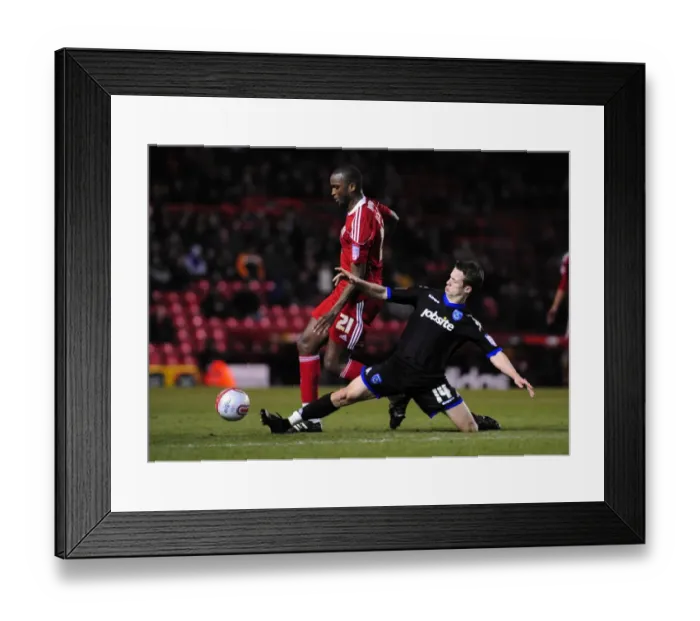 Framed Print : Intense Rivalry: Cisse vs. Hogg in the Championship Clash between Bristol City and Portsmouth - 8th March 2011