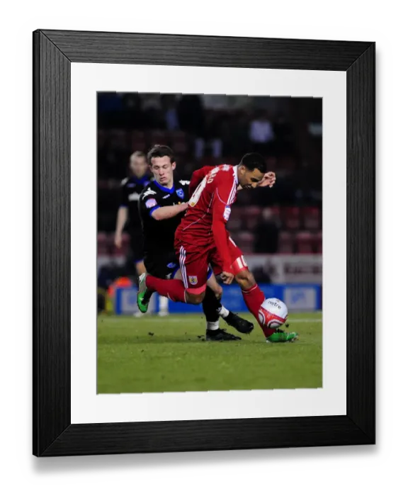 Framed Print : Intense Rivalry: Maynard vs. Hogg in the Championship Clash between Bristol City and Portsmouth, March 2011