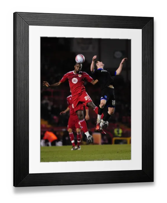 Framed Print : Bristol City vs Portsmouth: Kalifa Cisse vs Joel Ward - Championship Battle for the High Ball (08 / 03 / 2011) Framed Print : Bristol City vs Portsmouth: Kalifa Cisse vs Joel Ward - Championship Battle for the High Ball (08 / 03 / 2011)