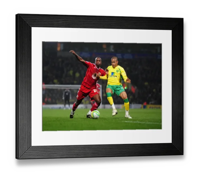 Framed Print : Battling for Control: Cisse vs. Jackson in the Intense Championship Clash between Norwich City and Bristol City - 14 / 03 / 2011 Framed Print : Battling for Control: Cisse vs. Jackson in the Intense Championship Clash between Norwich City and Bristol City - 14 / 03 / 2011